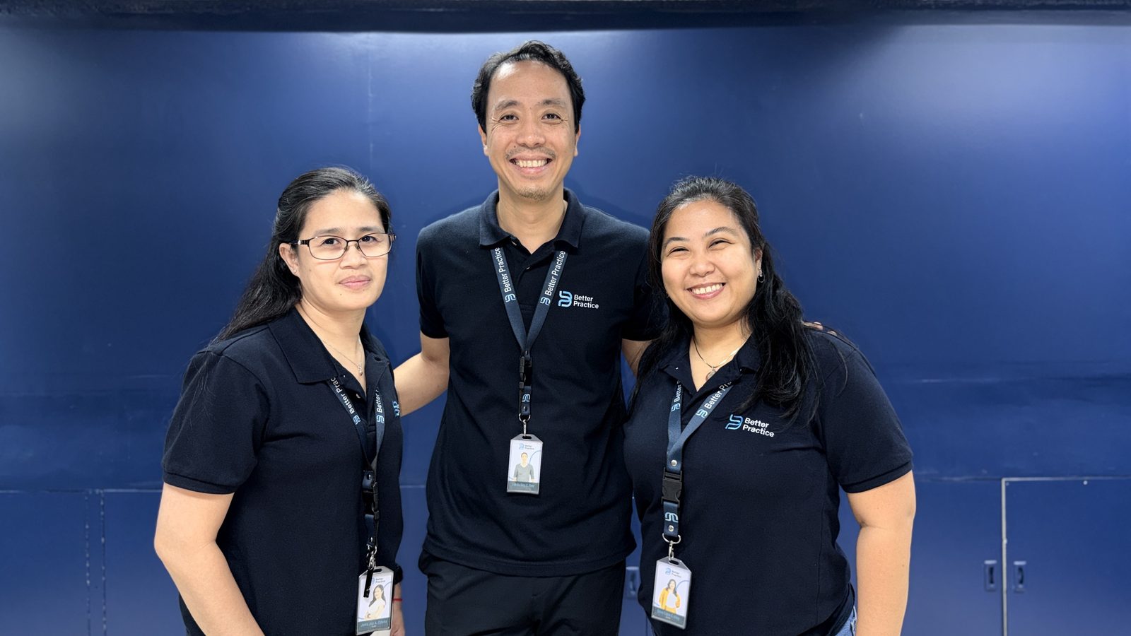 The management team standing together in Better Practice polo shirts